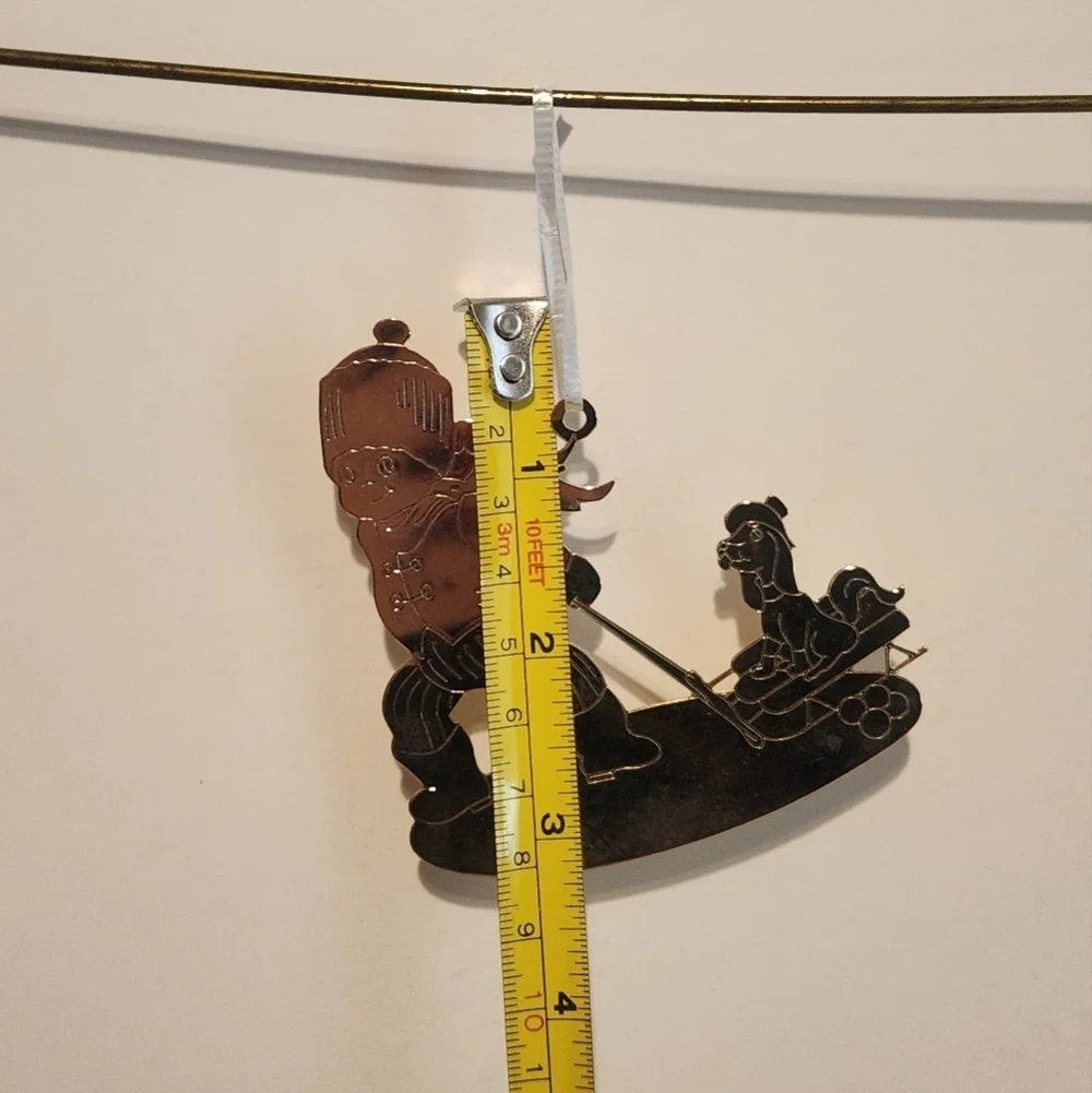 3 1/4” Vintage 1979 Pressed Brass Christmas Ornament Angel pulling Dog on Sled